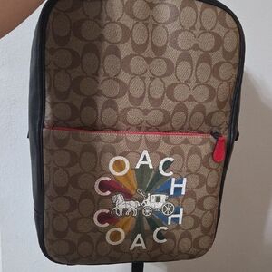 Coach Brown Signature Canvas Backpack with Multicolor Logo and Red Trim